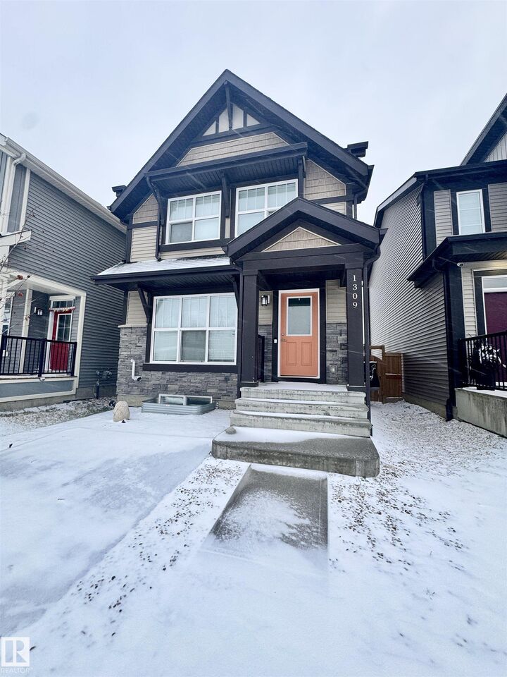 Property Photo: 1309 Darby Way SW AB T6W 4N3