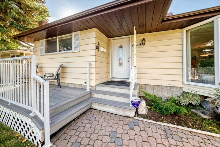 Property Photo:  12208 Canfield Road SW  AB T2W 1J9 