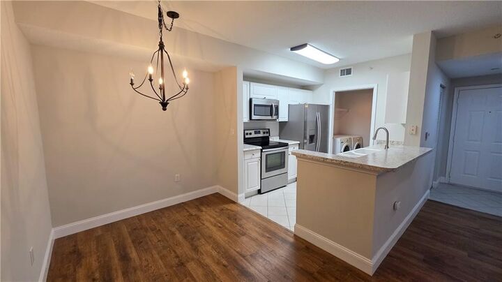Property Photo:  5090 Fairways Circle H105  FL 32967 