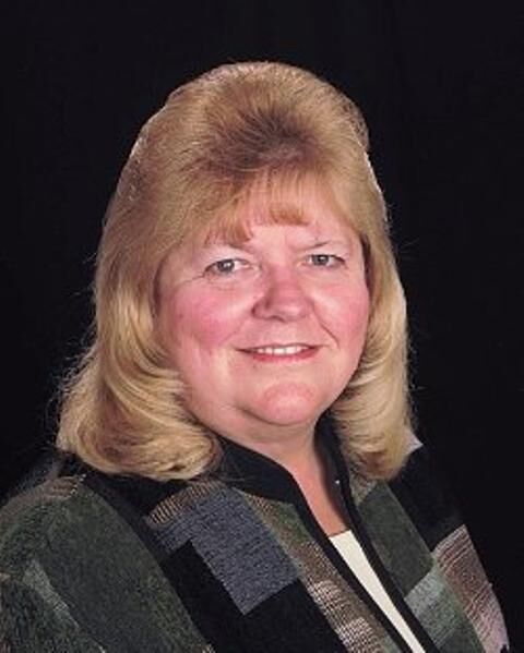 Sharon Woller, Real Estate Broker in Schofield, Action