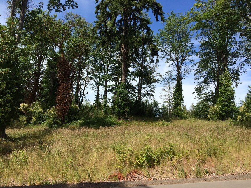 Property Photo:  3952 Southern Cross Rd NE  WA 98110 