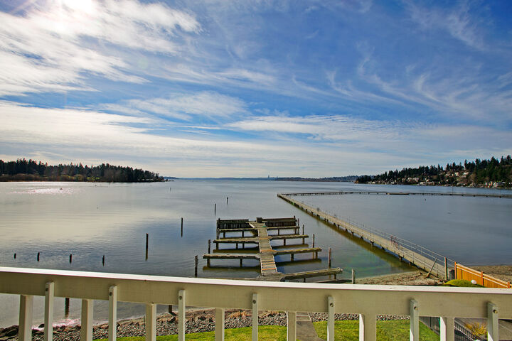 Property Photo: The living room with incredible views 9717 NE Juanita Dr 402 WA 98034
