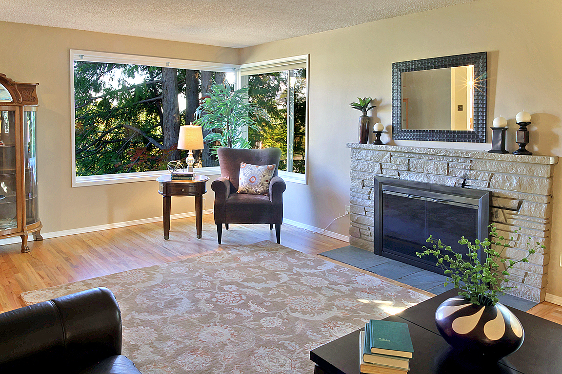 Property Photo: Living room with fireplace 5101 SW Andover St  WA 98116 