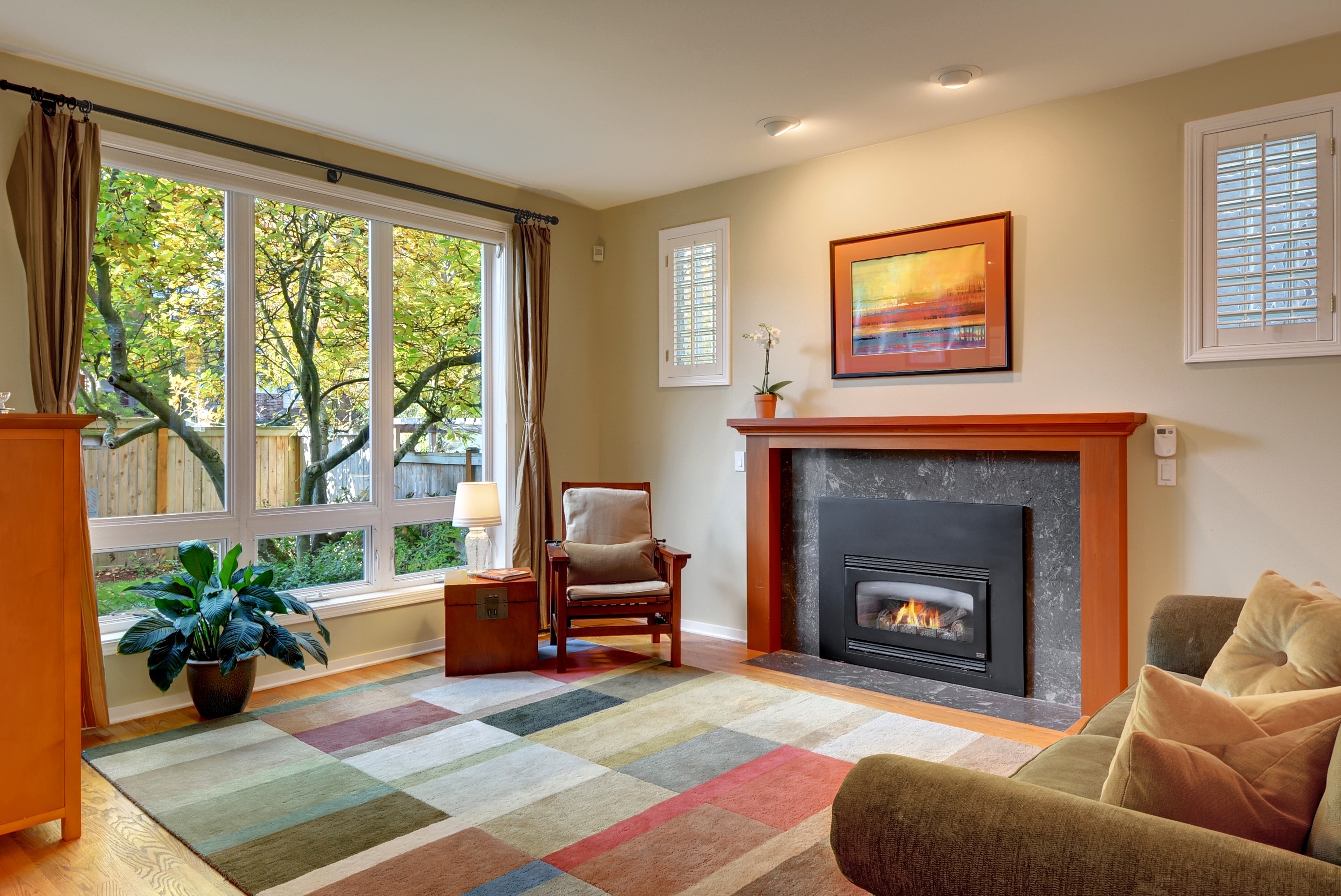 Property Photo: Sun-splashed living room 1904 6th Ave W  WA 98119 